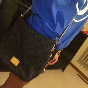 Large Michael Kors cross body.
